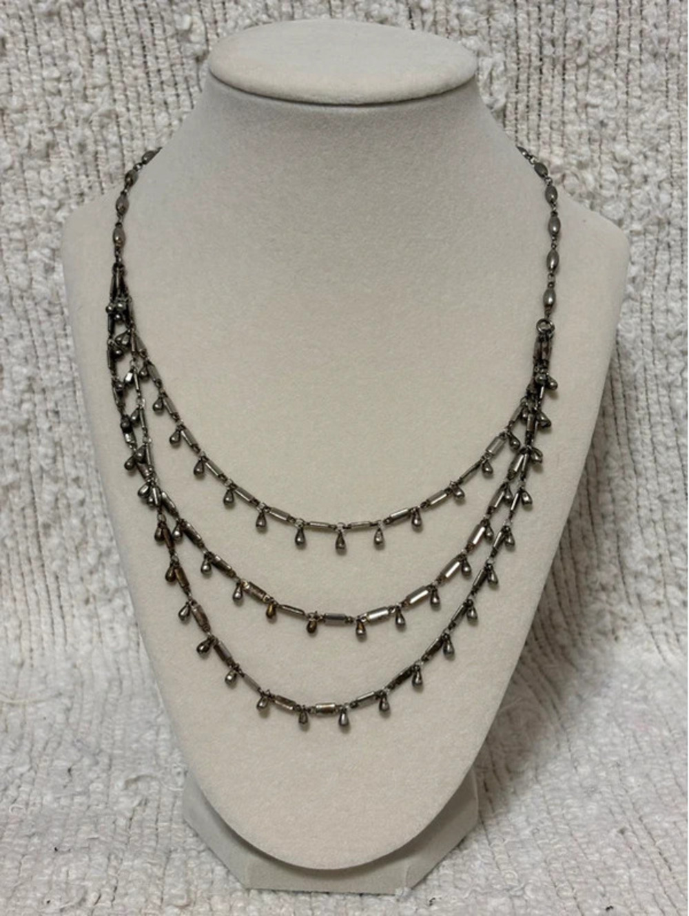 Silver toned layered necklace